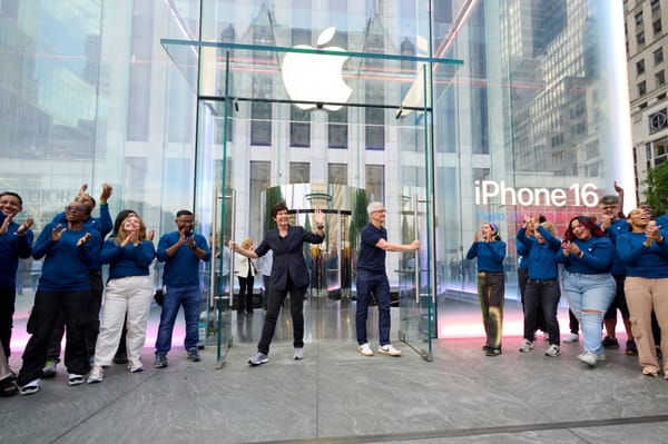 Deirdre O'Brien and Apple CEO Tim Cook ceremoniously open Apple's 5th Avenue New York location